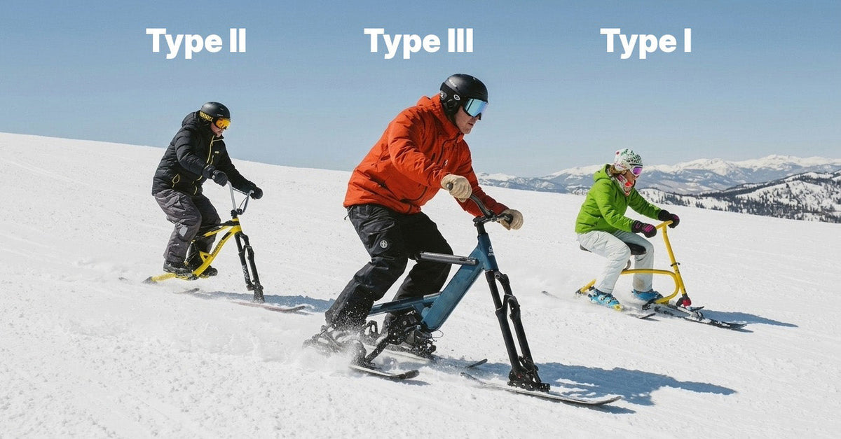 Three ski bikers gliding down the slope each on a different type of bike.